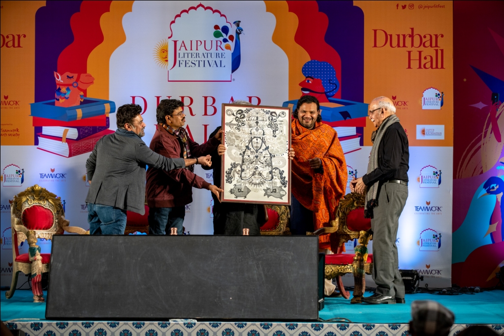 (9), JLF 2023- The participating artists Majunath Kamath, Santosh K Das and Bhajju Shyam present the art work Vishvaroopa print to Prof. BN Goswamy after the talk